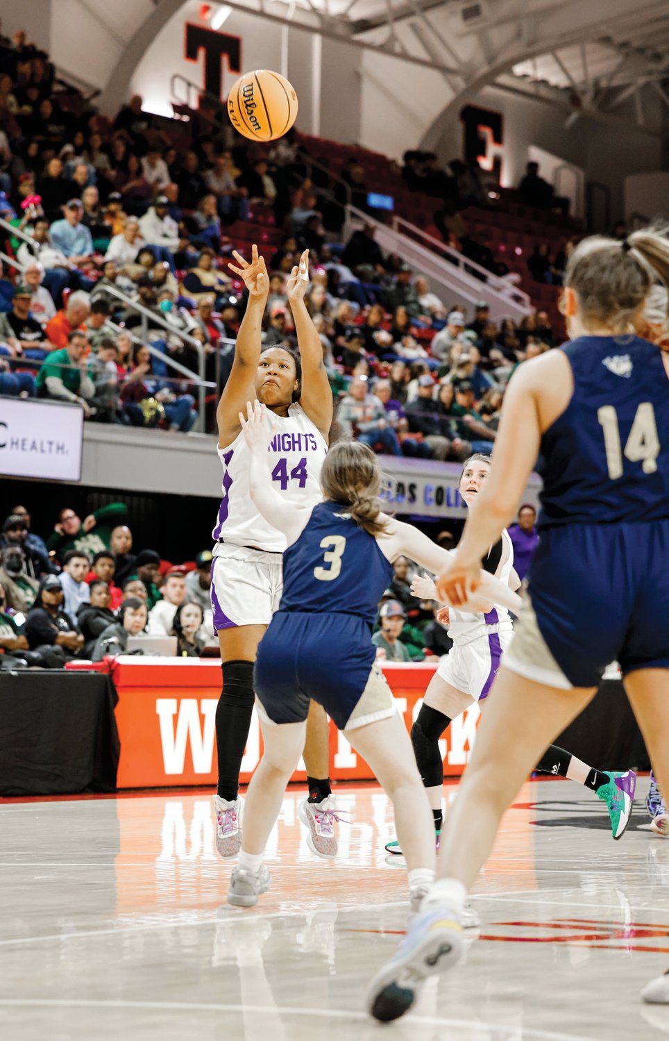 Chatham Charter junior Meah Brooks (44) scored a team-high 17 points in the Knights' 73-43 loss to Bishop McGuinness in the 1A girls state final Saturday.